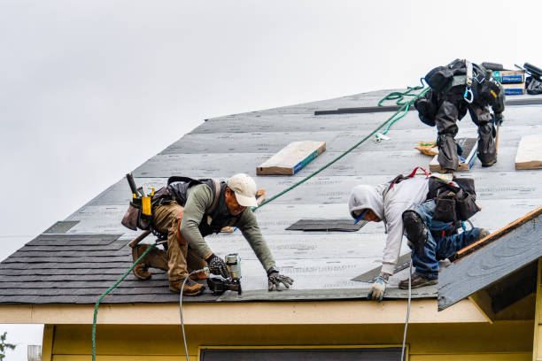 Professional Roofing technician working in Kulpsville, PA